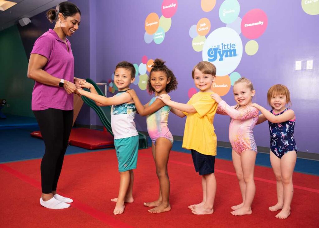 group of children in a gymnastics class at the little gym