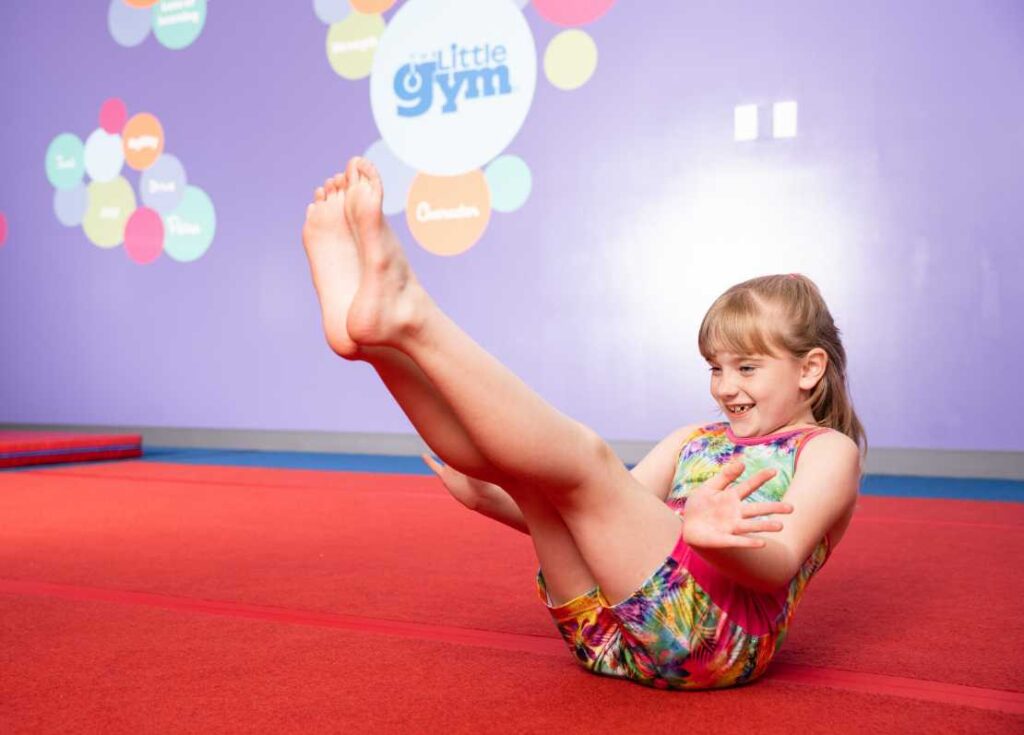 young girl doing gymnastics floor work